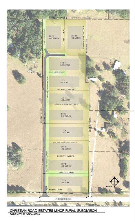 A large, leafy tree stands in the center of a grassy field with orange fencing — 0 CHRISTIAN ROAD Lot 2, DADE CITY, FL