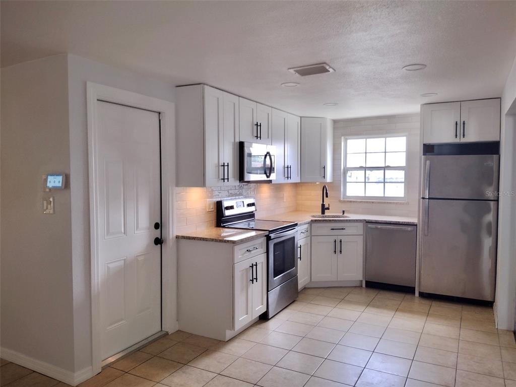 3117 HUNTINGTON ROAD, HOLIDAY, FL — photo 4 of 24