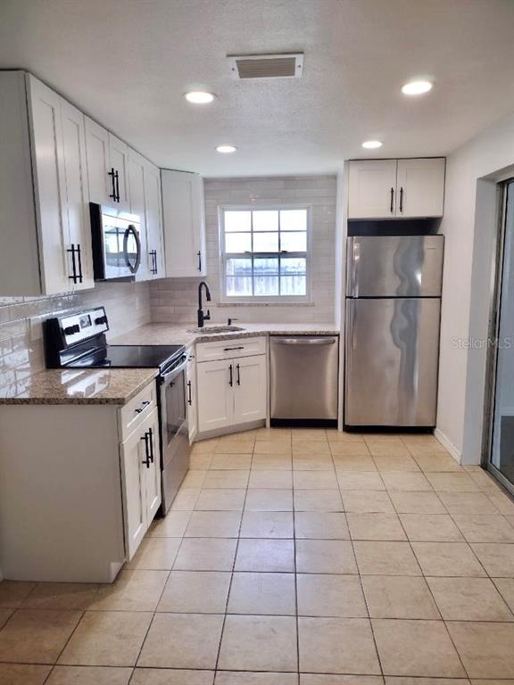3117 HUNTINGTON ROAD, HOLIDAY, FL — photo 5 of 24