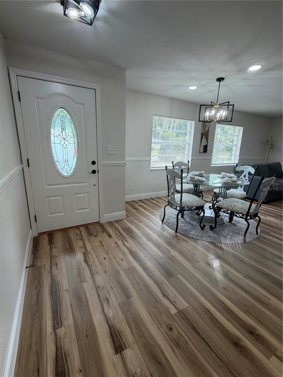 A single-story house with a light-colored exterior and a new wooden privacy fence — 3001 E FERN STREET, TAMPA, FL