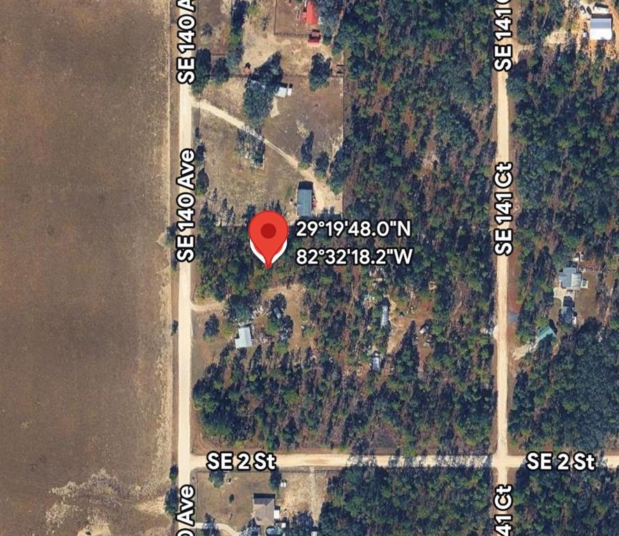 This is an aerial map view showing a residential lot with structures and surrounding streets — 11851 SE 138TH TERRACE, OCKLAWAHA, FL