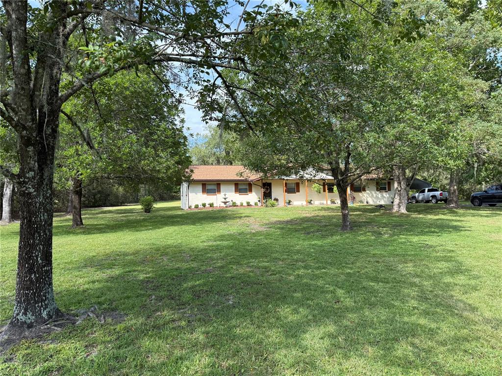 27275 NE COUNTY ROAD 125, LAWTEY, FL — photo 2 of 26