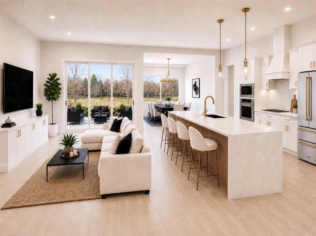 This is a rendering of an open-concept living room and kitchen with a large island — 18924 NORTHROP STREET, ORLANDO, FL