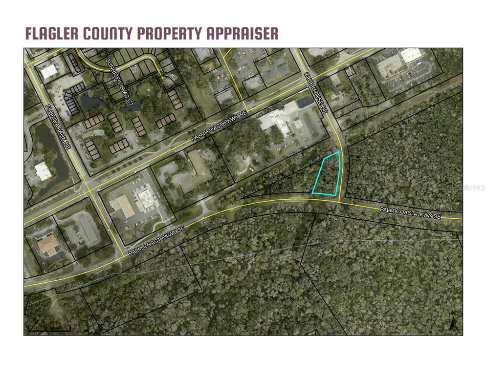 This is a property map showing a highlighted parcel of land near a road intersection — CLUB HOUSE DRIVE, PALM COAST, FL