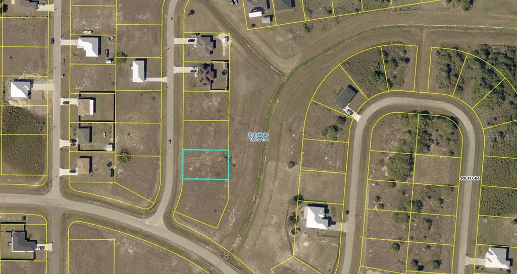 This is an aerial map showing a vacant residential lot highlighted in a suburban neighborhood — 7083 TIDE CIRCLE, LABELLE, FL
