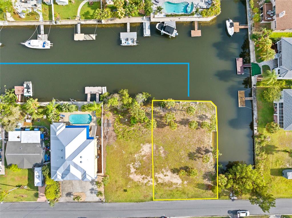 This aerial map shows a vacant waterfront lot with dimensions and seawall details overlaid — 4342 TAHITI DRIVE, HERNANDO BEACH, FL