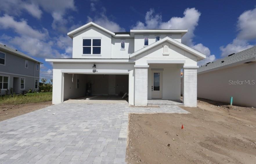 This is a floor plan for a single-story home featuring a two-car garage and lanai — 11804 FULL MOON LOOP, PARRISH, FL