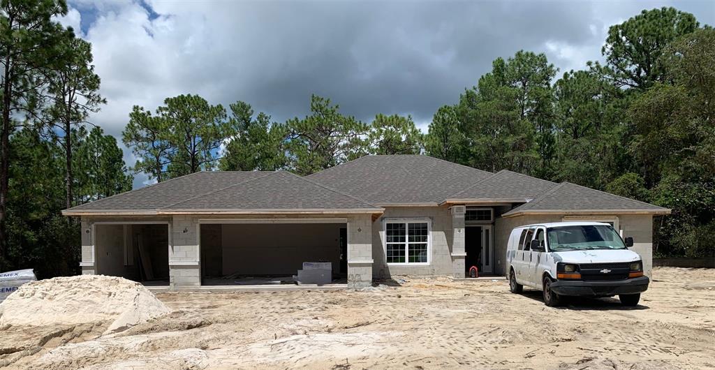 A concrete foundation slab for a new house sits on a cleared, sandy lot — 4807 W PINTO LOOP, BEVERLY HILLS, FL