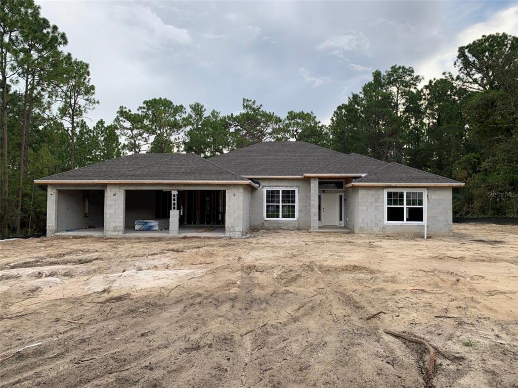 This floor plan shows a four-bedroom house with a two-car garage and optional master bath — 4807 W PINTO LOOP, BEVERLY HILLS, FL