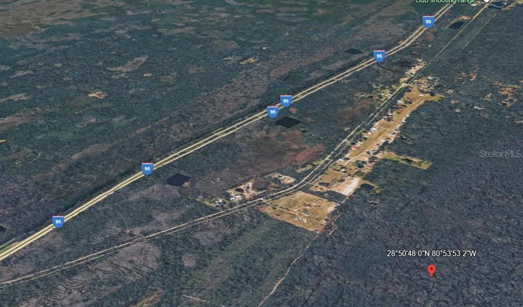 This aerial map view shows a rural area adjacent to Interstate 95 — MAYTOWN RD, OAK HILL, FL
