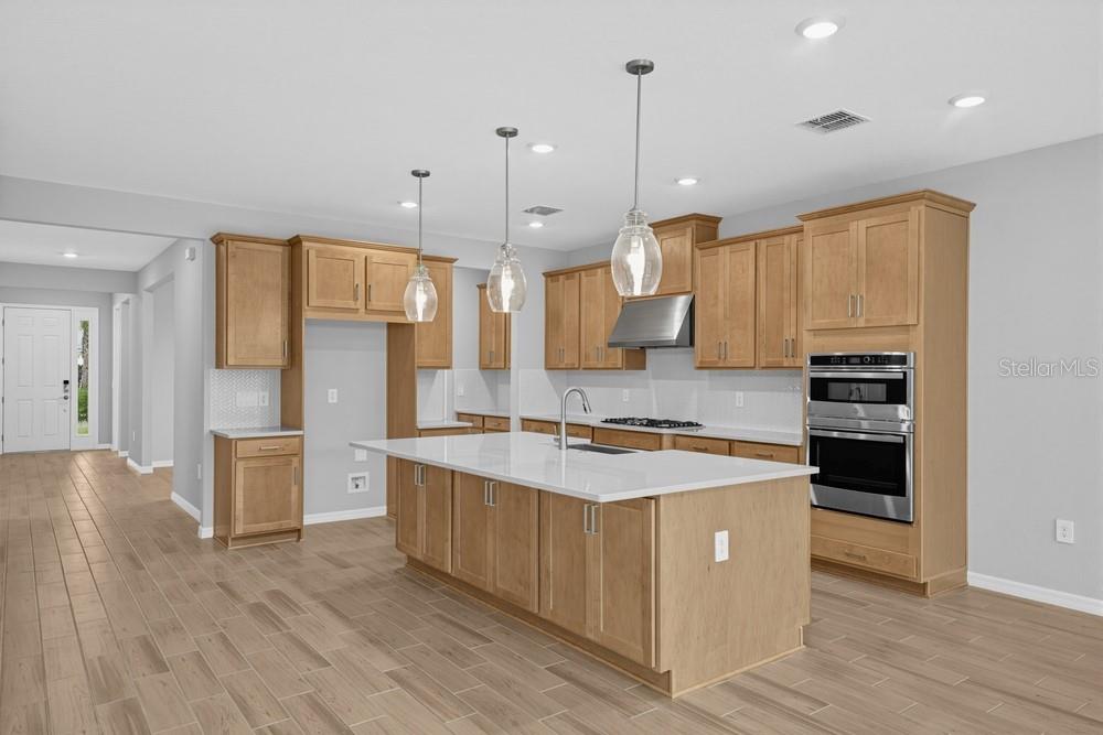 This is a floor plan for a single-story home with a two-car garage — 7801 CENTAURUS WAY, SARASOTA, FL