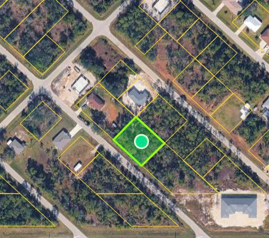 An aerial map view shows a highlighted vacant residential lot surrounded by wooded land — 11530 4TH AVENUE, PUNTA GORDA, FL
