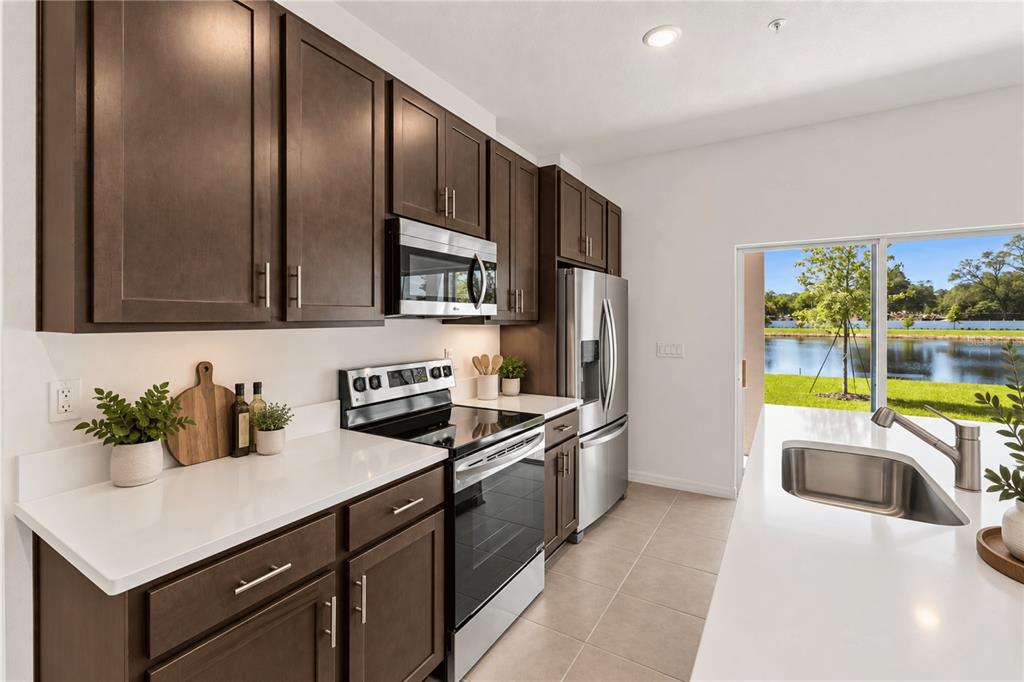 An empty room with white walls, recessed lighting, and wood-look flooring — 4941 WINDING RIVER ROAD, ORLANDO, FL