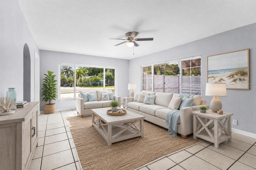 A kitchen with wood cabinets, stainless steel appliances, beige countertops, and a ceiling fan — 605 S FLORIDA AVENUE, TARPON SPRINGS, FL