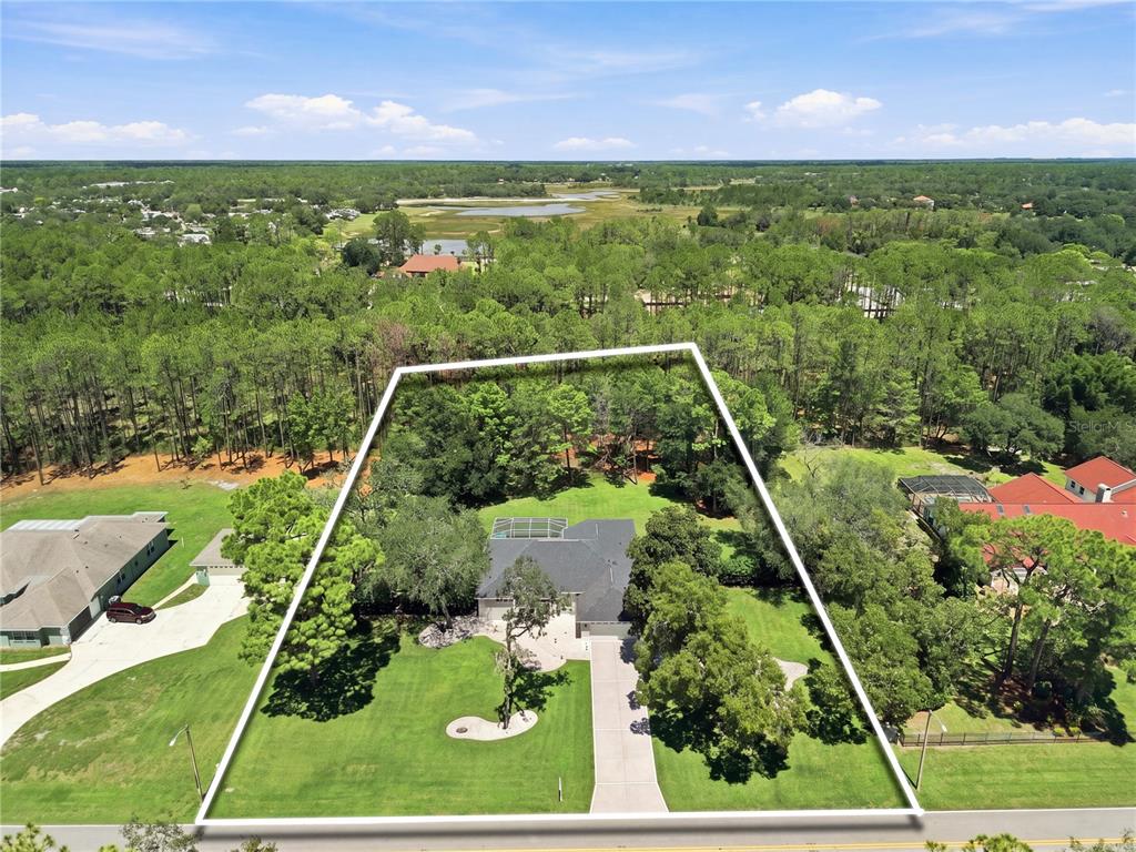 10261 WOODLAND WATERS BOULEVARD, WEEKI WACHEE, FL — photo 2 of 30