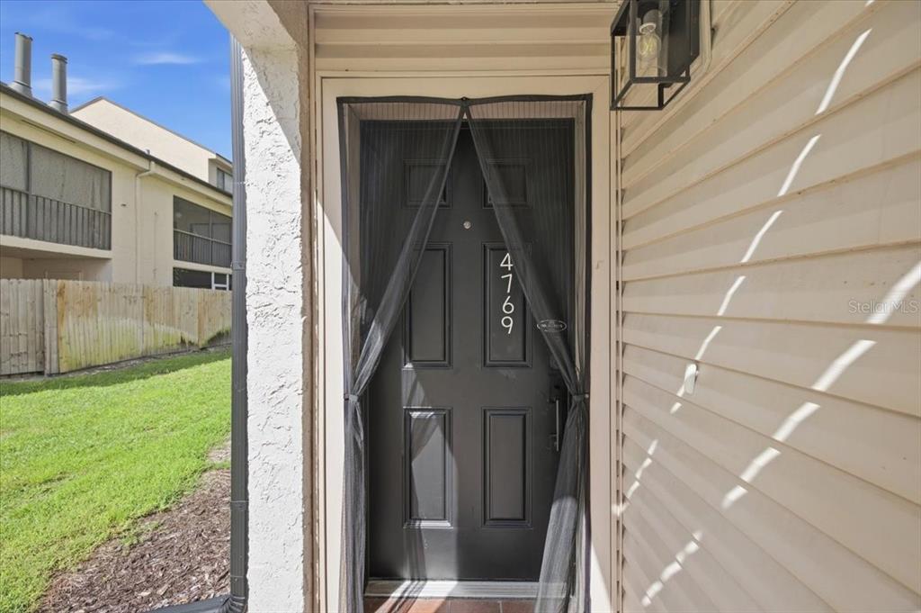 4769 PURITAN CIRCLE UNIT 401, TAMPA, FL — photo 2 of 30