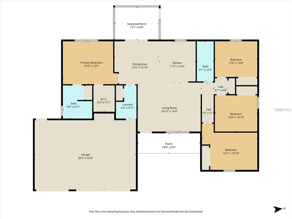 An open-concept living room and kitchen featuring light wood flooring, white cabinets, and stainless appliances — 6374 W RIO GRANDE DRIVE, BEVERLY HILLS, FL