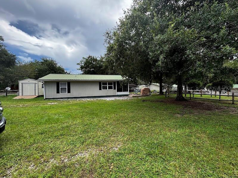 14076 NE 250TH CIRCLE UNIT 38, FORT MC COY, FL — photo 3 of 30