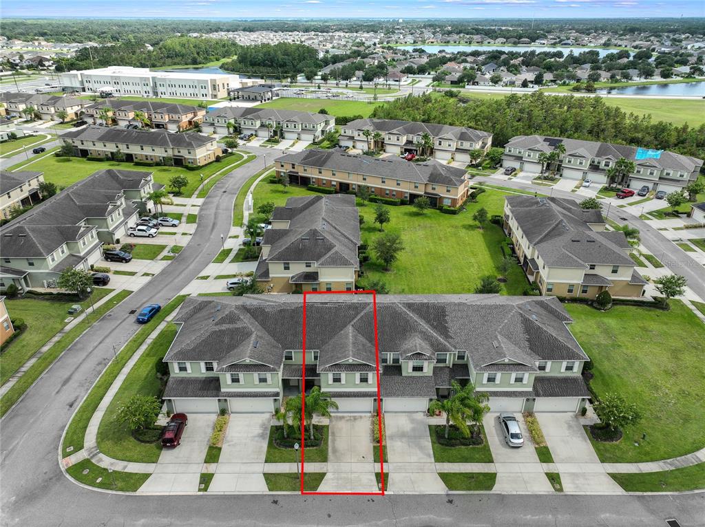 An aerial view of a townhouse complex with a red box highlighting a specific unit — 3349 RODRICK CIRCLE, ORLANDO, FL