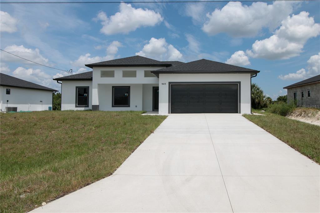 943 COMMODORE STREET, LEHIGH ACRES, FL — photo 2 of 19