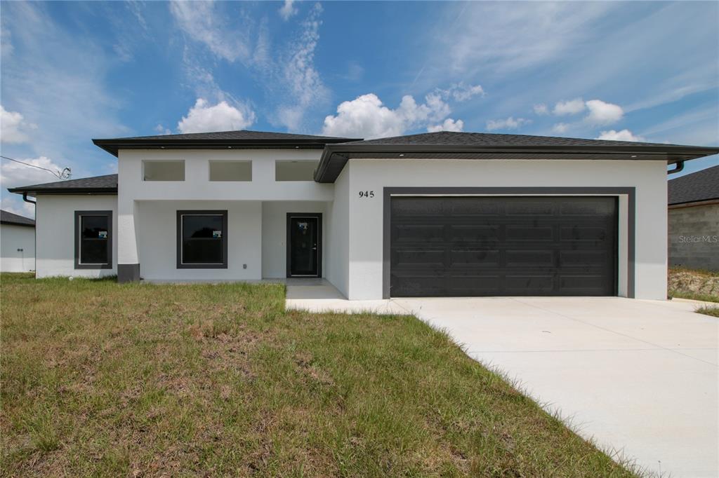 943 COMMODORE STREET, LEHIGH ACRES, FL — photo 3 of 19
