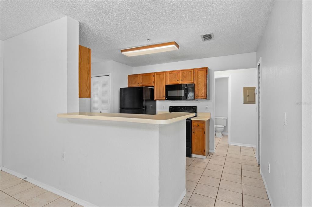 1141 EXCELLER COURT UNIT 107, CASSELBERRY, FL — photo 3 of 26