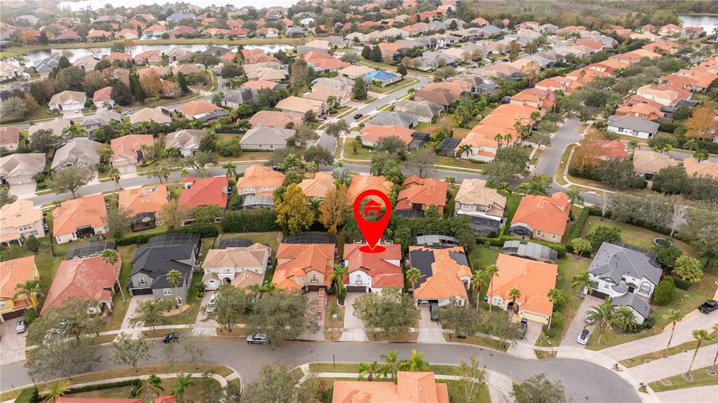 An aerial view shows a residential neighborhood with a red pin marking a specific house — 11410 RAPALLO LANE, WINDERMERE, FL