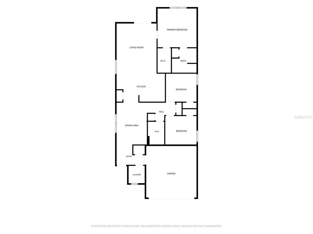 This is a floor plan showing a home with a garage, kitchen, and three bedrooms — 1360 CORK DRIVE, ORMOND BEACH, FL