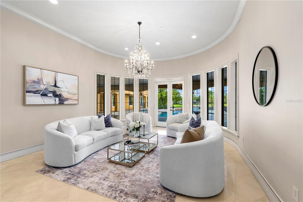 A large, empty room with polished concrete floors, recessed lighting, and white walls — 1795 W LAKE MARY BOULEVARD, LAKE MARY, FL
