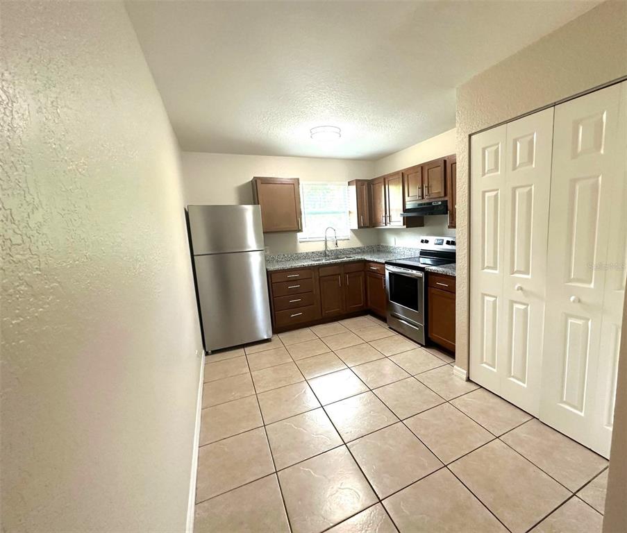 4170 BARNA AVENUE UNIT E, TITUSVILLE, FL — photo 5 of 8
