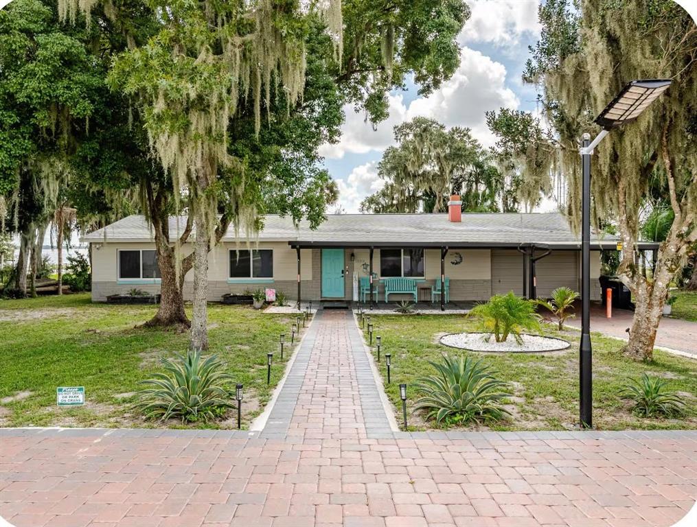 1409 N LAKE REEDY BOULEVARD, FROSTPROOF, FL — photo 3 of 26
