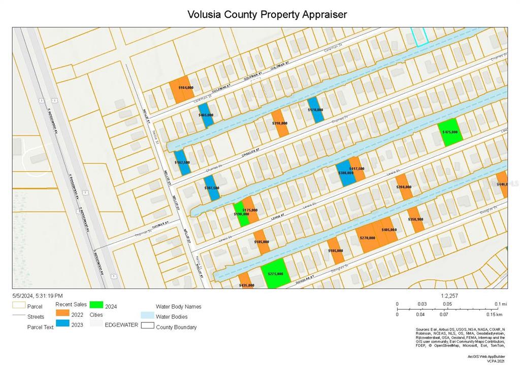 This is a property tax map showing parcel boundaries, street names, and recent sale prices — CHARLES ST STREET, EDGEWATER, FL