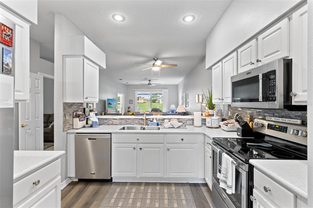 This is a floor plan for a single-story residential home with a garage — 146 CLUB VILLAS LANE, KISSIMMEE, FL