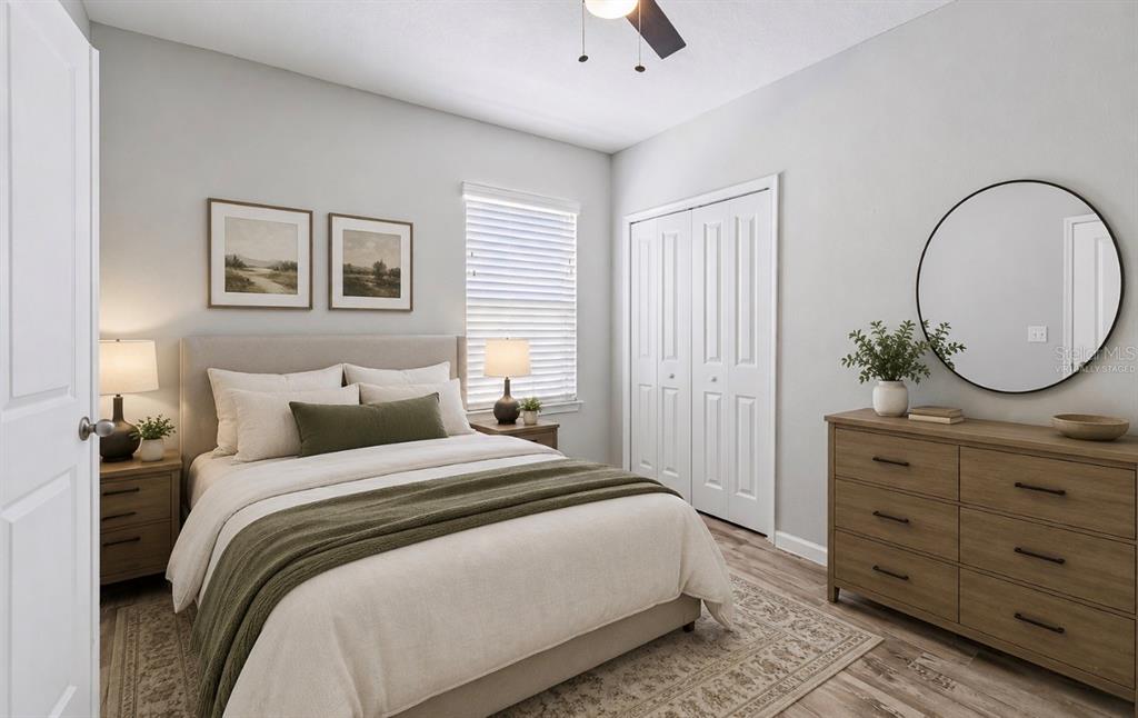 A view from an open doorway into a hallway with tile flooring and gray walls — 18307 TURNING LEAF CIRCLE, LAND O LAKES, FL
