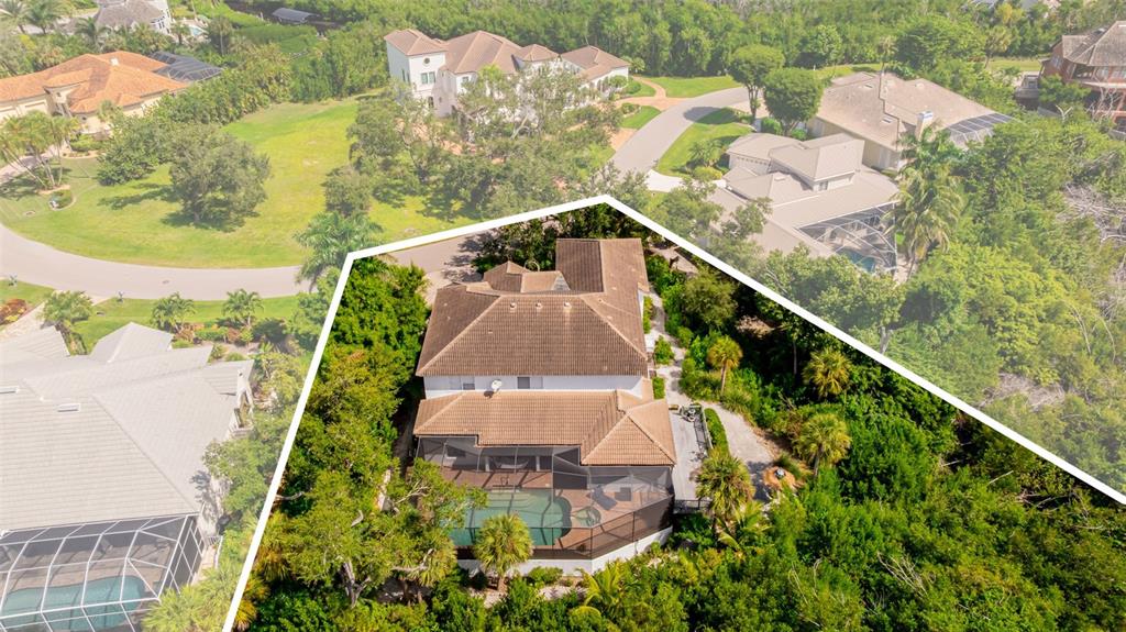 A two-story white house with a paved driveway and a large tree in the front — 13881 BLENHEIM TRAIL ROAD, FORT MYERS, FL