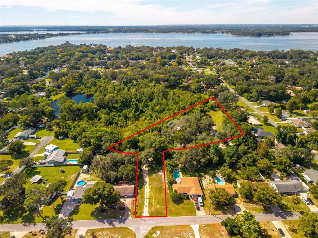 696 N SUNSET DRIVE, MOUNT DORA, FL — photo 2 of 23