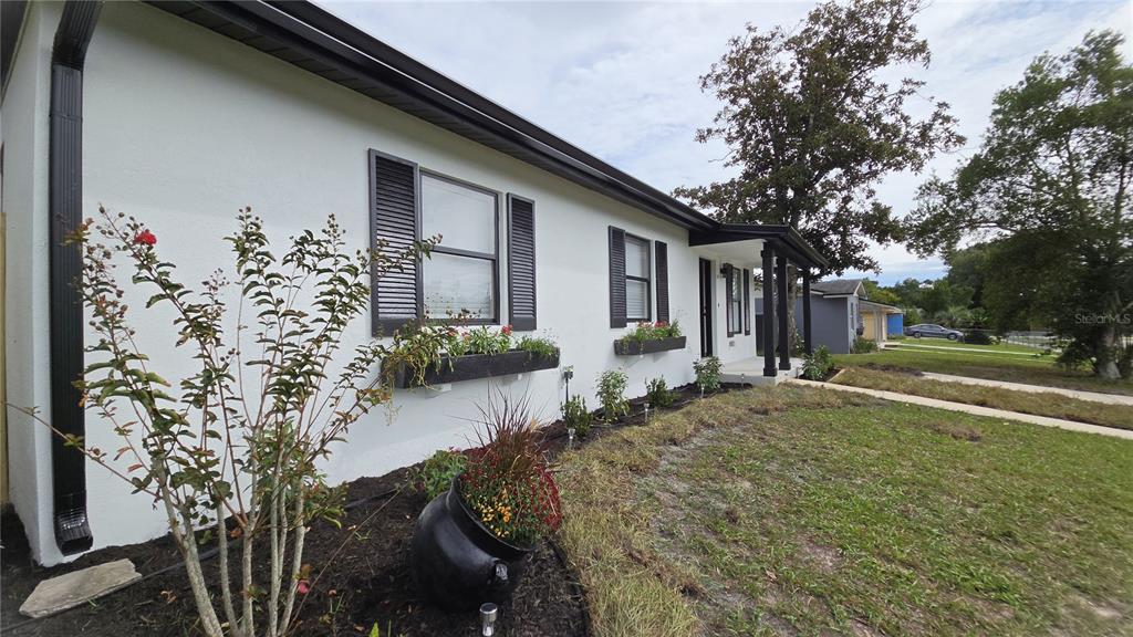 1031 COBBLESTONE AVENUE, DELTONA, FL — photo 2 of 28