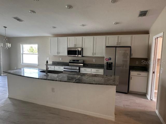 1073 SILAS STREET, HAINES CITY, FL — photo 4 of 12