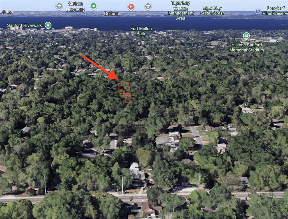 An aerial map view shows a wooded residential area with a red outline marking property — 2400 PRINCETON, SANFORD, FL