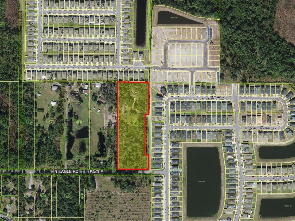 An aerial map shows a rectangular vacant lot outlined in red next to a residential neighborhood — 5455 N EAGLE ROAD, ST CLOUD, FL