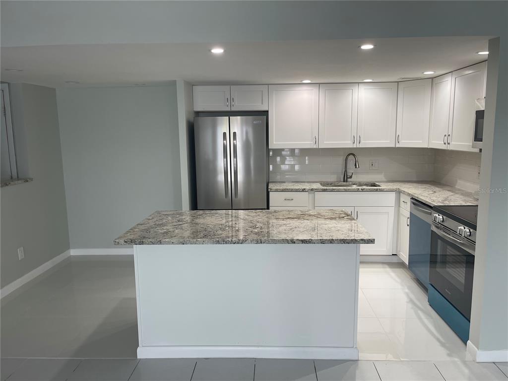 851 BAYWAY BOULEVARD UNIT 205, CLEARWATER BEACH, FL — photo 4 of 25