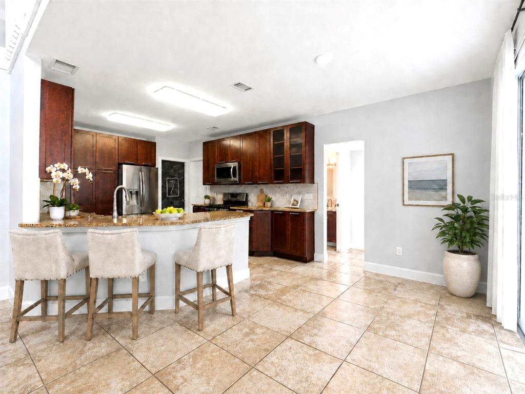 This is a two-story floor plan showing a house with a garage, pool, and loft — 1610 LEDGESTONE DRIVE, BRANDON, FL