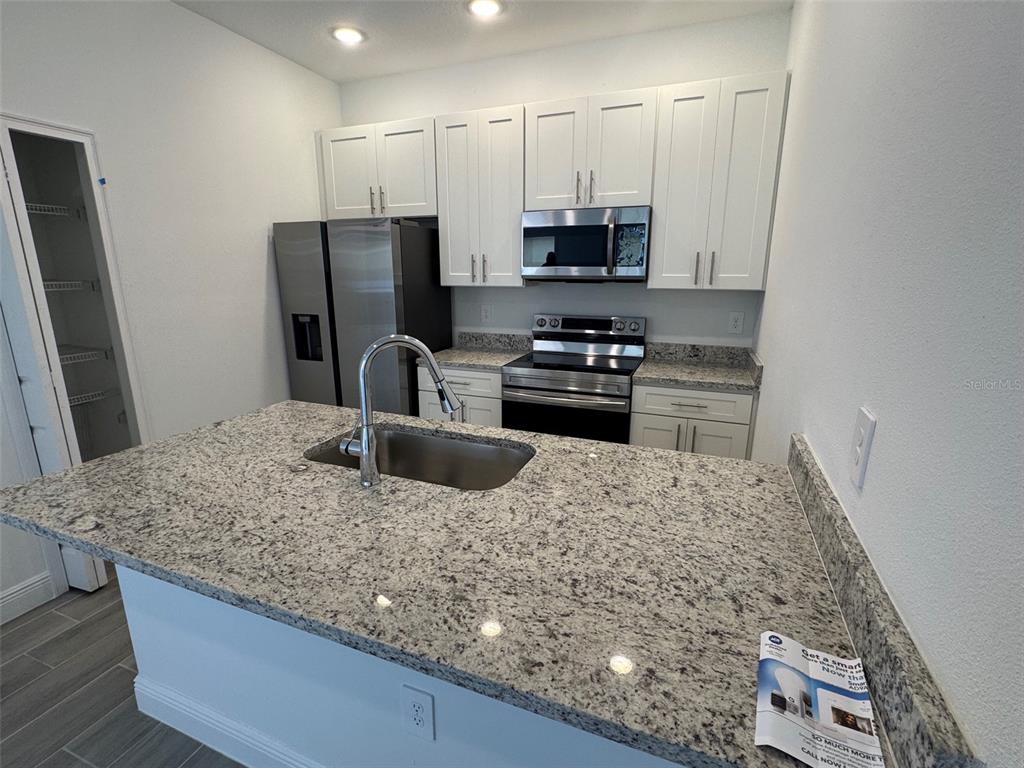1604 CUMIN DRIVE, POINCIANA, FL — photo 4 of 15