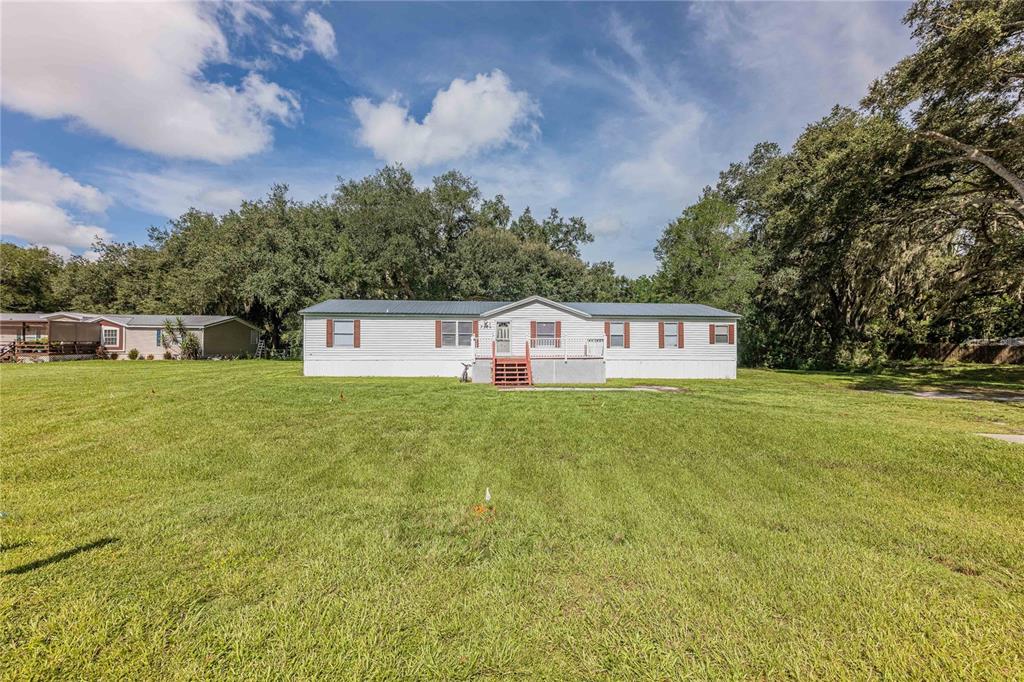 7309 RYMAN LOOP, ZEPHYRHILLS, FL — photo 2 of 30
