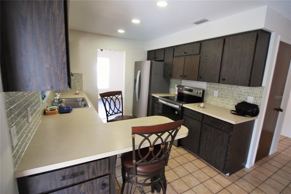 390 LILAC ROAD, CASSELBERRY, FL — photo 3 of 27