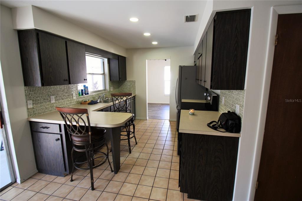 390 LILAC ROAD, CASSELBERRY, FL — photo 4 of 27