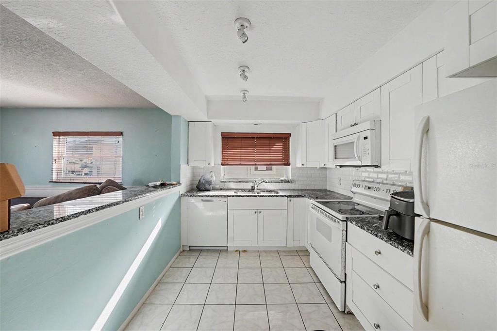 515 129TH AVENUE E, MADEIRA BEACH, FL — photo 2 of 28