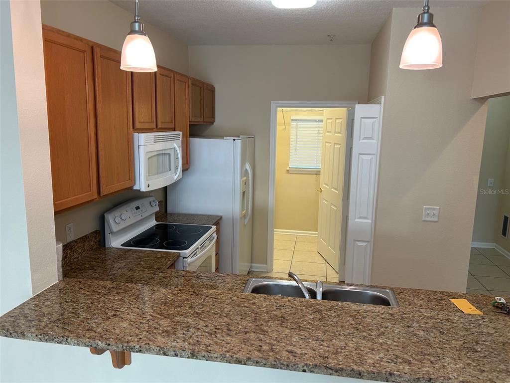 403 BOUCHELLE DRIVE UNIT 211, NEW SMYRNA BEACH, FL — photo 5 of 24