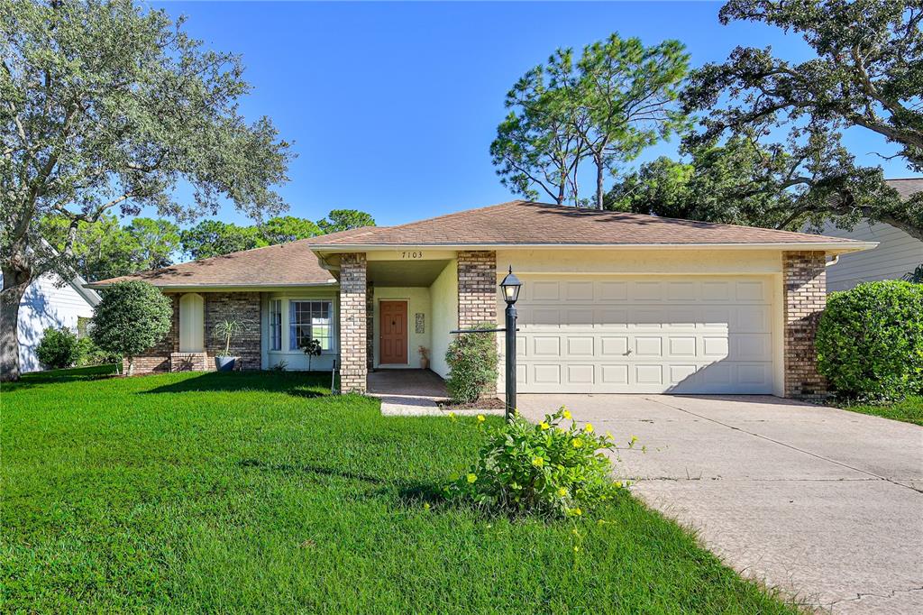 7103 CROWN OAKS DRIVE