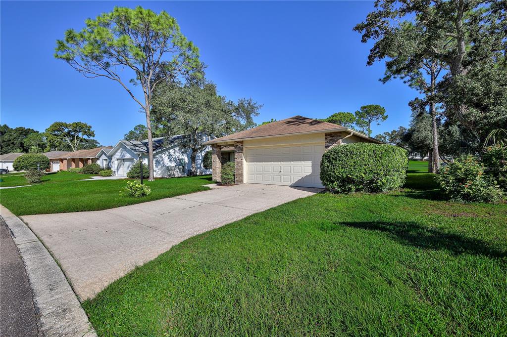 7103 CROWN OAKS DRIVE, SPRING HILL, FL — photo 3 of 75
